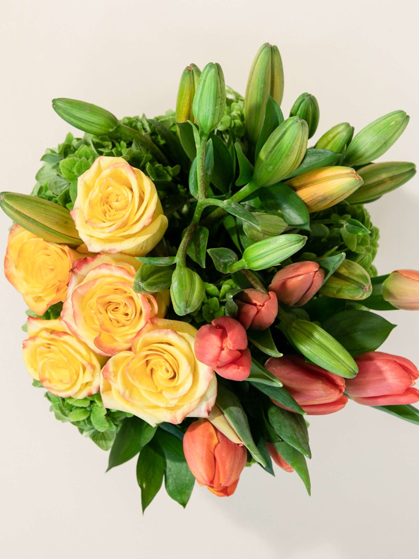 Roses Tulips Lilies Galore! Appropriate for any occasion, but perfect