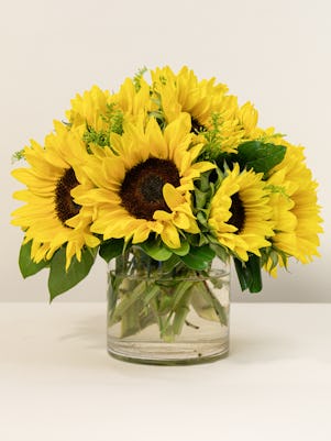 Vase of Smiling Sunflowers