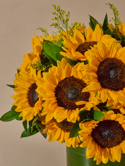Vase of Smiling Sunflowers